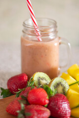 Closeup fruit smoothie with strawberry kiwi mango fruits sugar sweet diet organic morning freshness drinks cocktail beverage