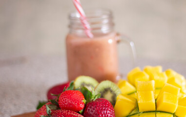 Closeup fruit smoothie with strawberry kiwi mango fruits sugar sweet diet organic morning freshness drinks cocktail beverage