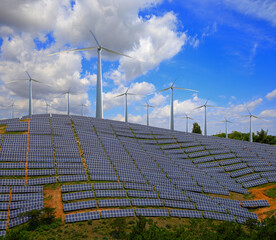 Solar photovoltaic panels and wind turbines. Energy concept