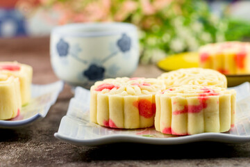 Close up, Homemade bakery concept. Delicious pineapple cookies look like mooncake on white plate with copy space.