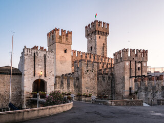 Fototapeta na wymiar Sirmione Castle or Castello Scaligero or Rocca Scaligera on Lake Garda in Northern Italy