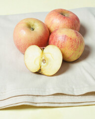Fresh red apples are rich in benefits. Apples contain vitamin C. Apples include fruit that is rich in fiber. Apples are suitable as a menu when running a diet program. Apple mockup. Focus blur.