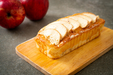 apple loaf crumbled on wood board