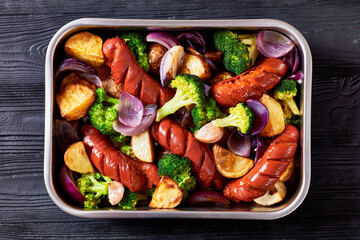 Sausage and vegetable traybake, top view, close-up