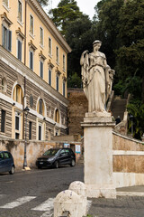 Old statue in Piazza del Popolo (People's Square), Rome, Italy 
