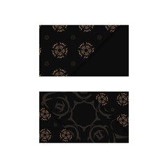 Business card in black with a luxurious brown pattern for your contacts.