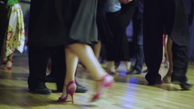 Close-up of feet of people dancing tango, close-up