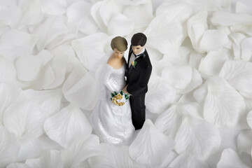 wedding day concept with bride and groom cake toppers