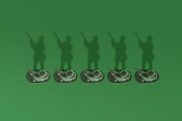 Plastic Toy Soldiers on a Green Background