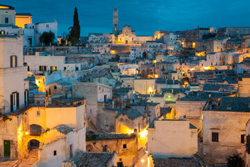 Naklejka premium Matera. Night view of Sasso Caveoso towards the Cathedral from Piazzetta Pascoli.
