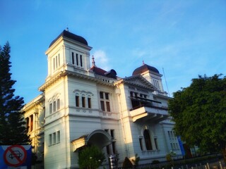 Fototapeta na wymiar Bank Indonesia Jogjakarta, used to be De Javasche Bank built under the rule of Dutch East Hindies still erected magnificently in the heart of the city Yogyakarta