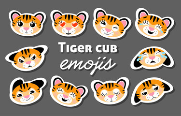 Fototapeta premium Vector colorful set of emoji stickers with tigers (symbol of 2022 New Year). Little cute tiger cubs, isolated on grey background. Animal characters with different emotions (happy, sad, angry, crying)
