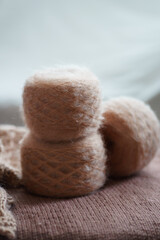 three skeins of light fluffy yarn for knitting. materials for needlework and hobbies. passion for self-isolation.
