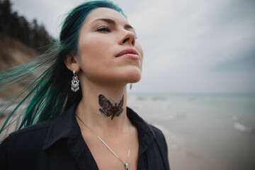 portrait of a beautiful woman with blue hair that flutters in the wind