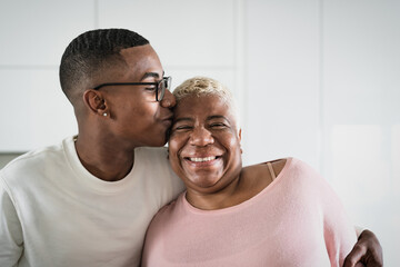 Happy Hispanic mother and son portrait - Parents love and unity concept - Powered by Adobe