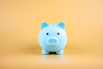 Savings, investments, and interest. Piggy bank isolated on yellow background. with copy space
