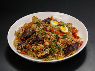 Uzbek traditional plov - rice with meat