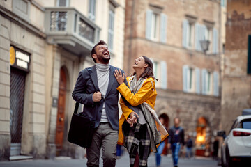 Happy caucasian couple enjoying the walk together