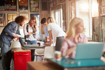 Group of work colleagues brainstorming together
