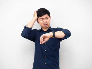 Man feeling strain touch his head about looking at his watch time late concept