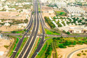 top view or aerial view of a new modern city developing in the heart of the desert in the middle east   