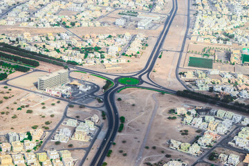 top view or aerial view of a new modern city developing in the heart of the desert in the middle east   