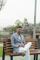 Businessmen is sitting and smiling