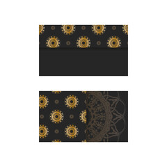 Black business card with luxurious gold ornaments for your contacts.