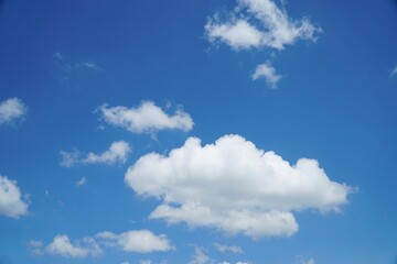 Naklejka na ściany i meble Natural daylight and white clouds floating on blue sky