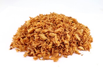 Heap of crispy fried onions pieces on white background