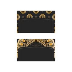 Black business card with Greek gold pattern for your business.