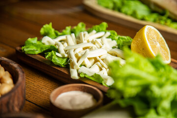 hot meat snacks for beer served on wooden dish