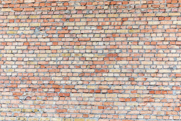 Texture of yellow brick on the wall of a new house. Brick for textures and backgrounds