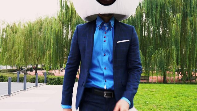 Storytelling video of a businessman wearing a giant panda mask. 