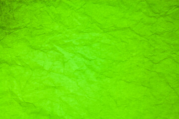 Green paper crumpled texture background.