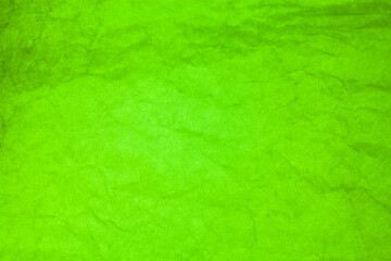 Green paper crumpled texture background.