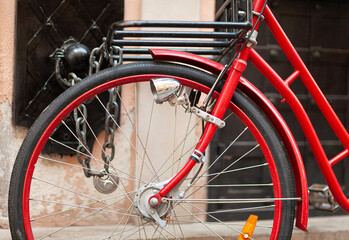Ladies' retro bicycle with a headlight on the front wheel.