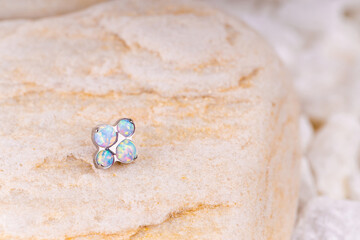 Beautiful piercing jewelry. Macro shot. Selective focus.