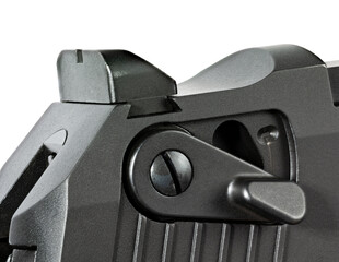 Pistol with safety on with a white background