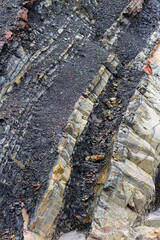 Mountain rock layers formations over the hundreds of years. Interesting background with fascinating texture, high quality background