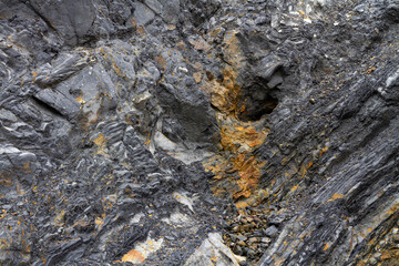 Mountain rock layers formations over the hundreds of years. Interesting background with fascinating texture, high quality background