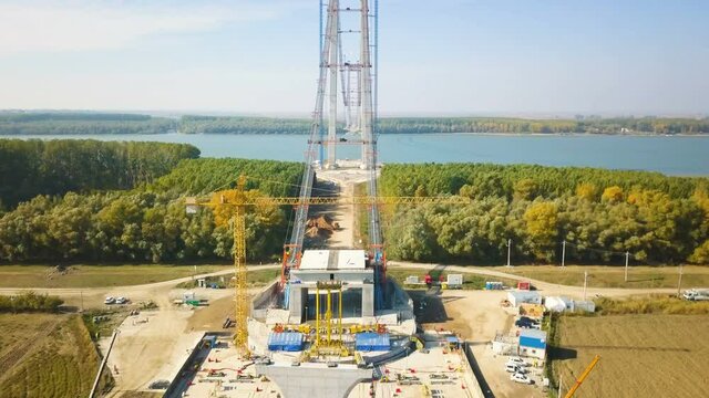 Tulcea, Romania - 20 October 2021: The construction of a new suspension bridge over the Danube, the third longest bridge in Europe