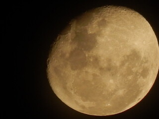 full red moon zoom picture with night black background