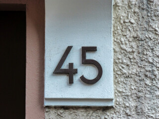 Metal number on a home