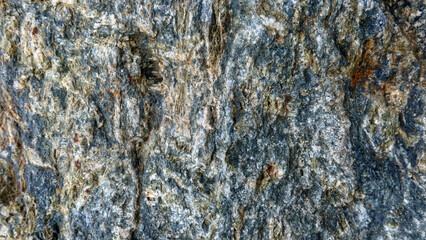 The picture is taken from a hard rock texture commonly found in mountainous areas and rivers, it can be used as material for the construction of houses, buildings and many other functions.