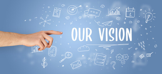 Close-Up of cropped hand pointing at business inscription