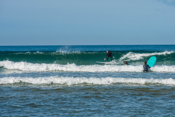 senior surfer in action in the waves