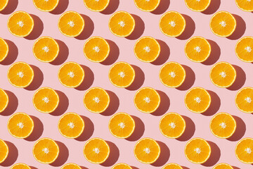 Fruit pattern of fresh ripe slice orange on pink background. Top view, copy space for your text. Fruit composition, healthy concept. - 464694062