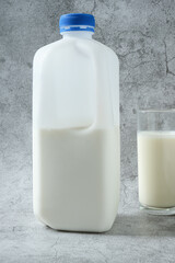 Milk gallon and glass of milk
