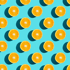 Seamless fruit pattern of fresh orange slices on blue background. Top view. Copy Space. Pop art design, creative summer concept. Half of citrus in minimal flat lay style.
